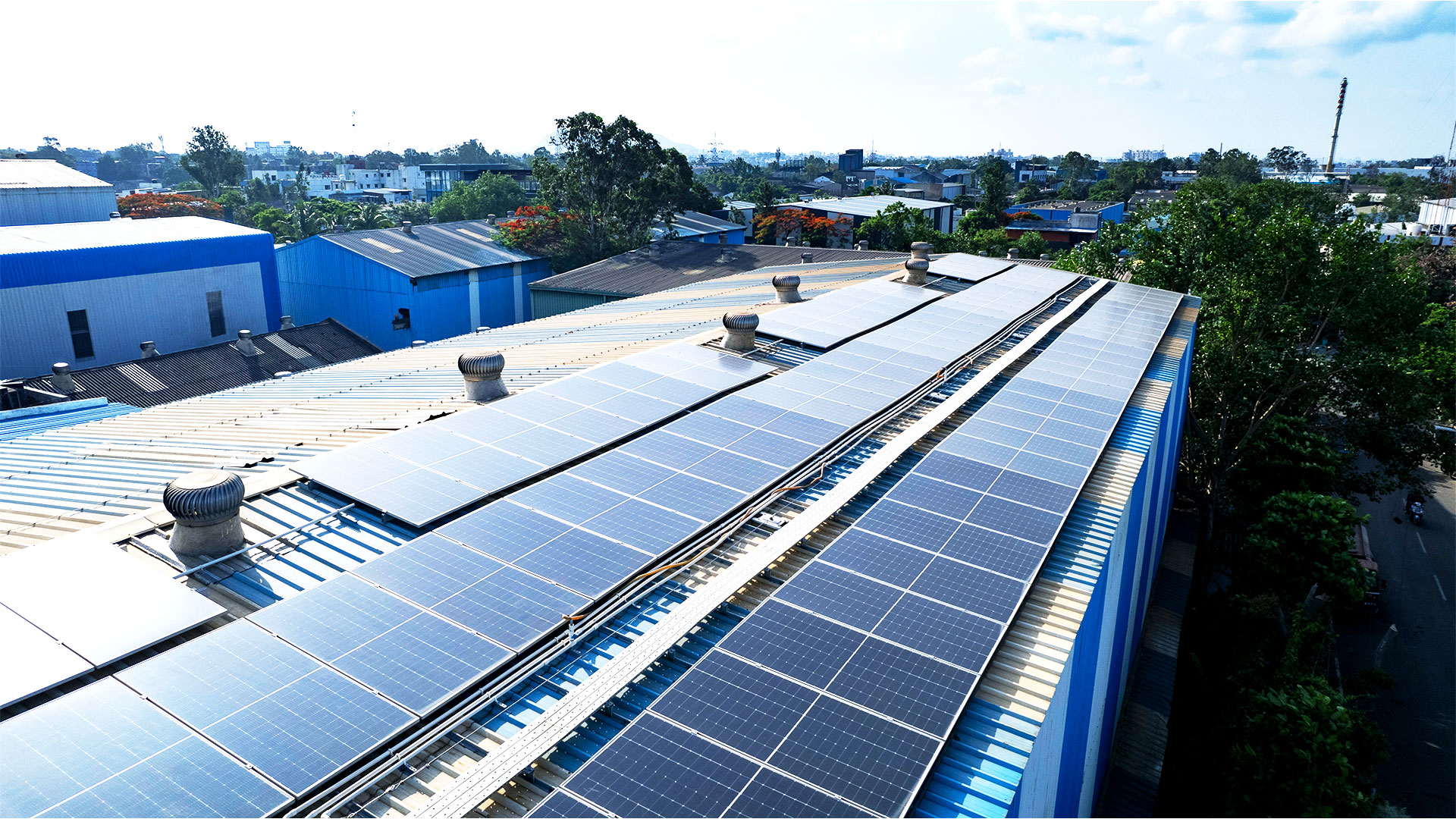 Rooftop solar panel installation at sunrise